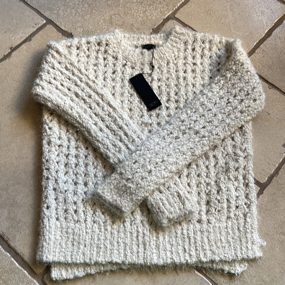 Brand new cream colored sweater